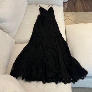 Gorgeous Fame Partners Lace Black Gown.